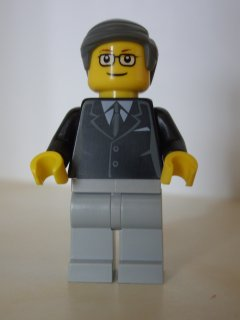 LEGO Brand Store Male, Black Suit, Light Bluish Gray Legs, Dark Bluish Gray Smooth Hair (no specific back printing) {Glasgow} (tls081)